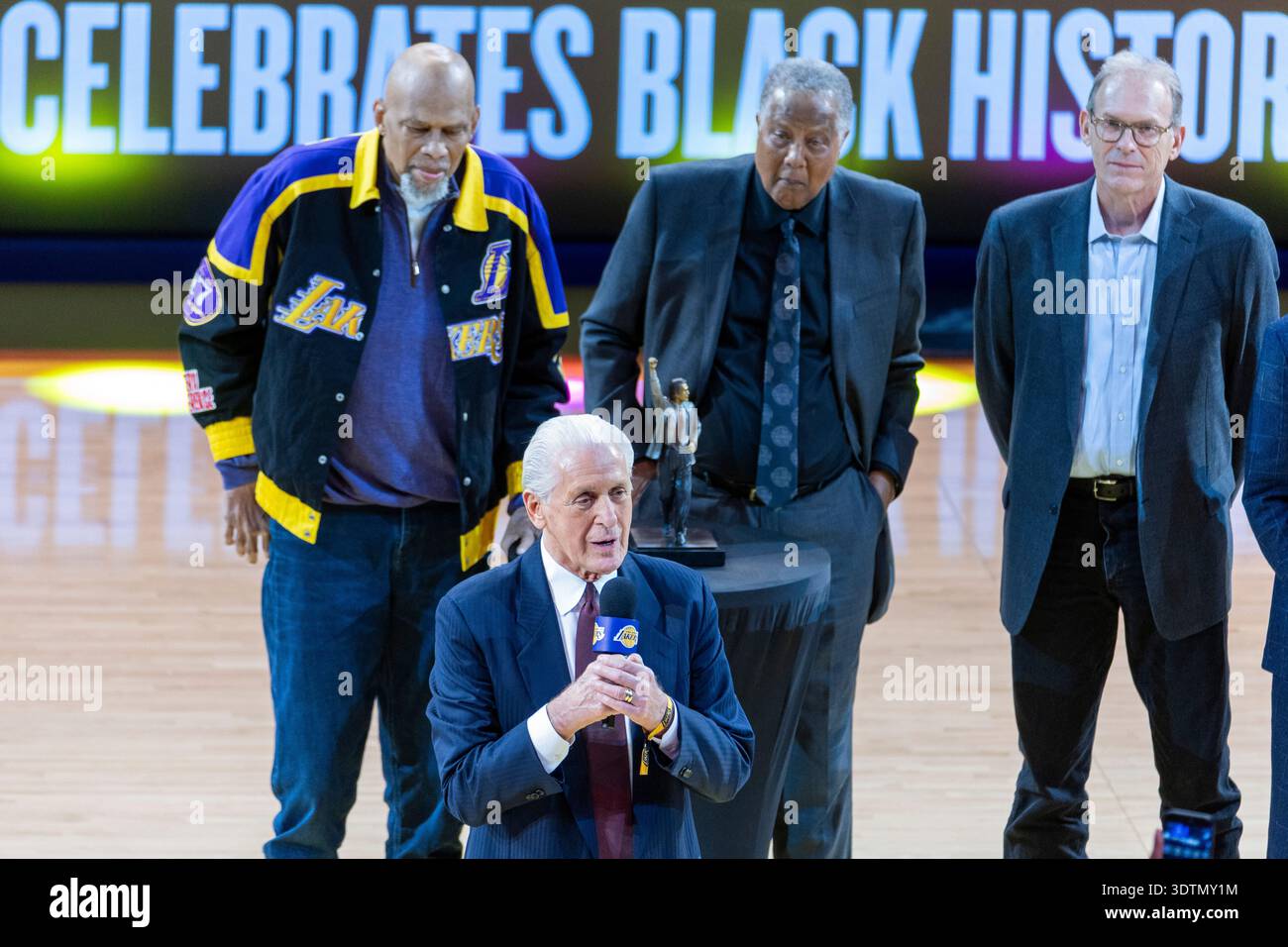 Pat Riley is honored during halftime of an NBA basketball game between ...