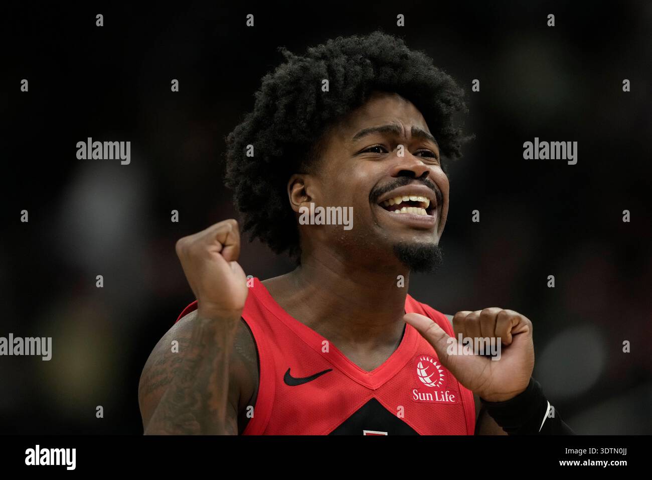 Toronto Raptors' Jamal Shead gestures during an NBA basketball game ...