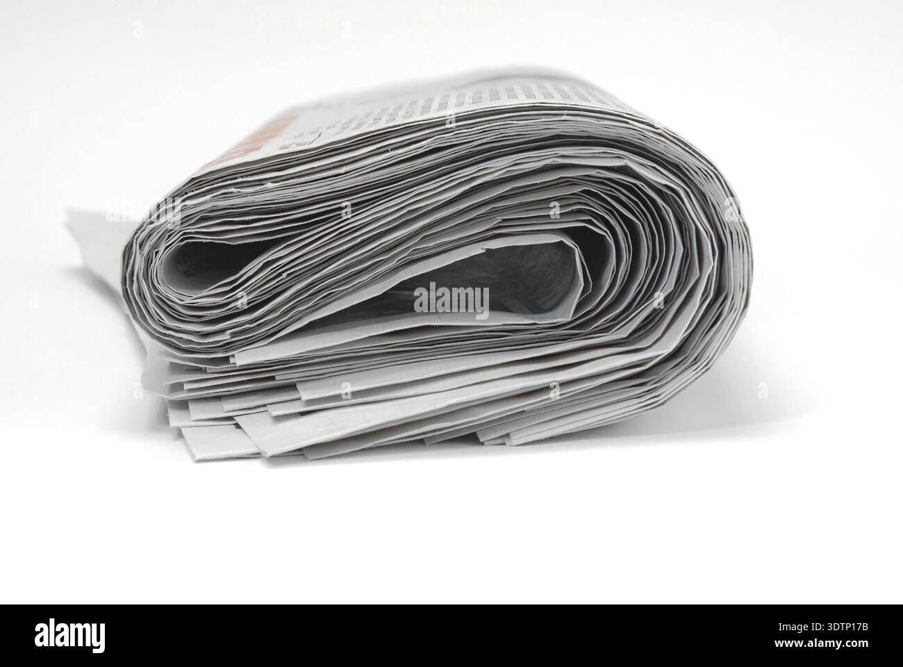 Roll of old newspapers Stock Photo