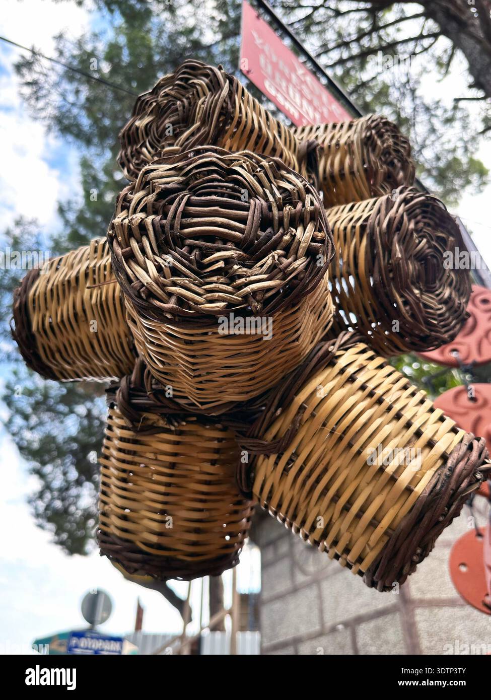 A few hanging wicker baskets Stock Photo
