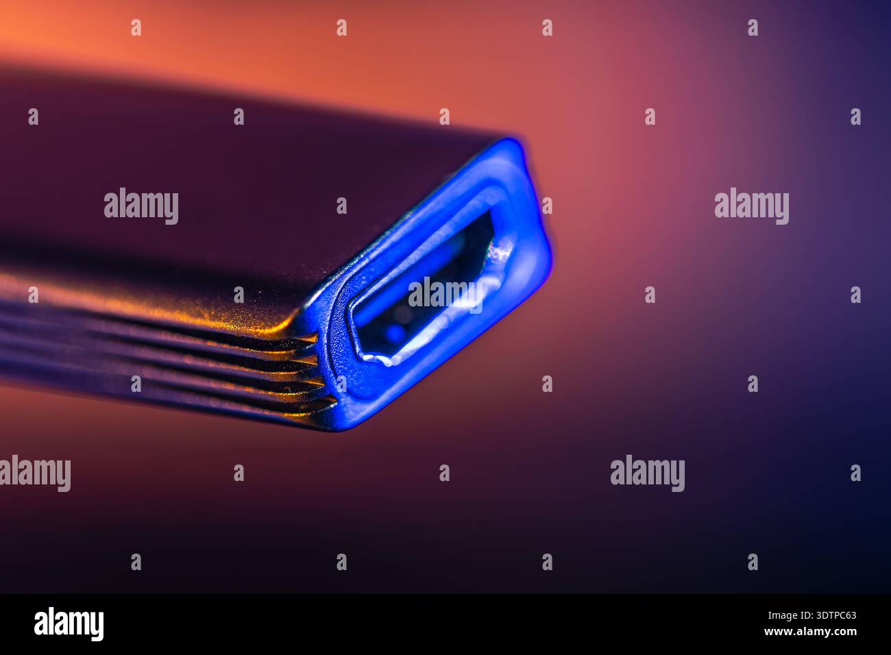 Macro usb type c port in neon light. Connector closeup. Stock Photo