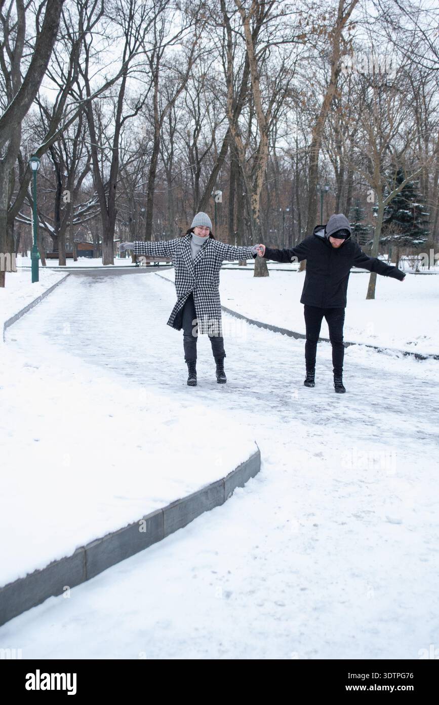 Young Couple Walking in Winter Stock Photo