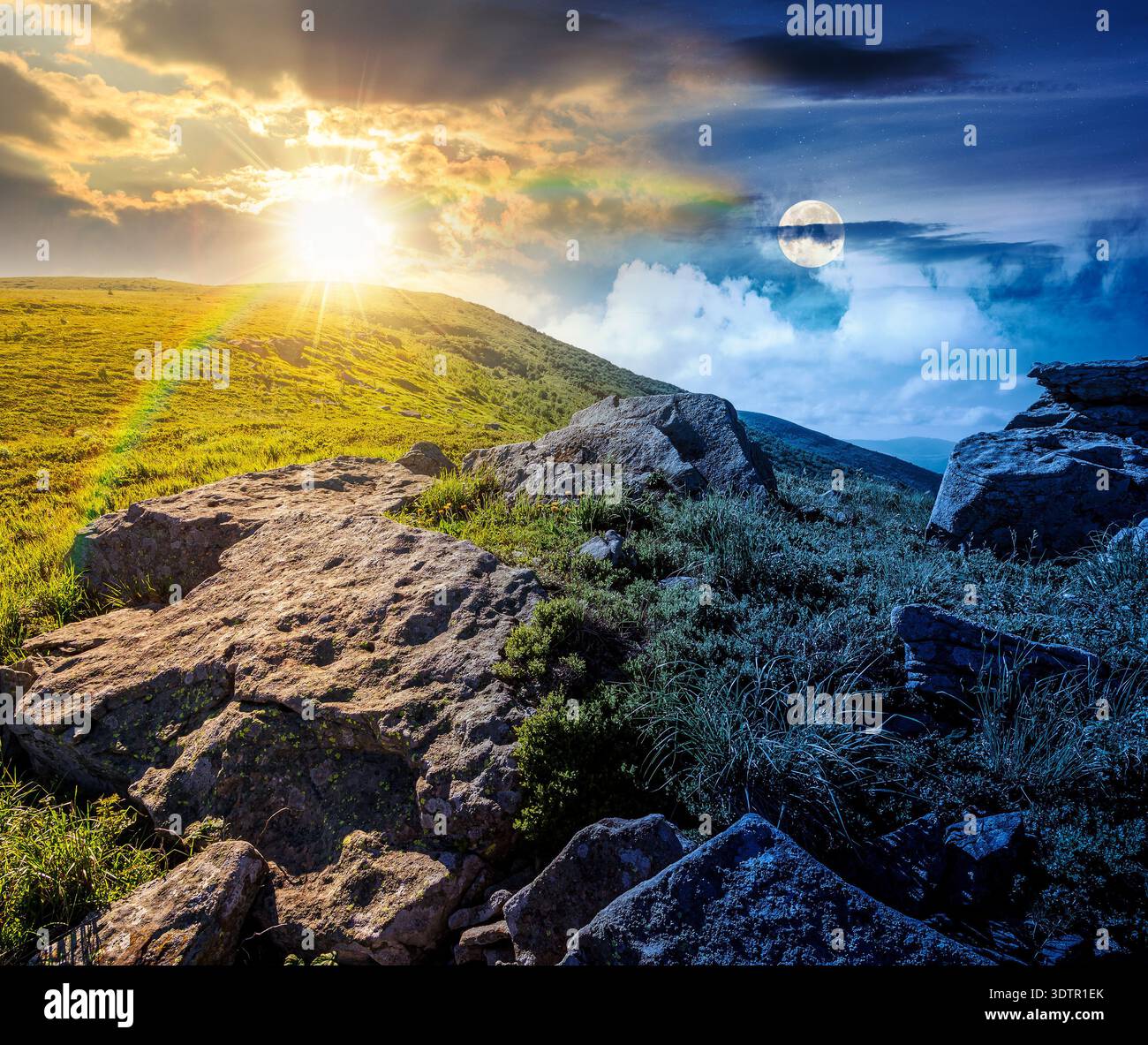 mountain landscape on summer solstice. day and night time change concept. green grass and rocks on hillside with sun and moon at twilight. beautiful v Stock Photo