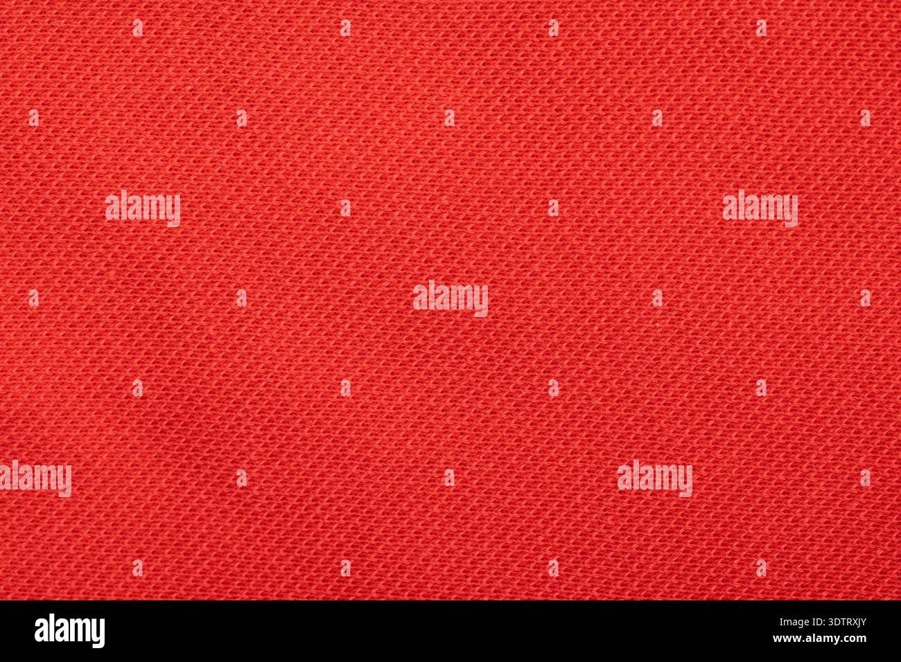 Red cotton fabric texture close up background Stock Photo