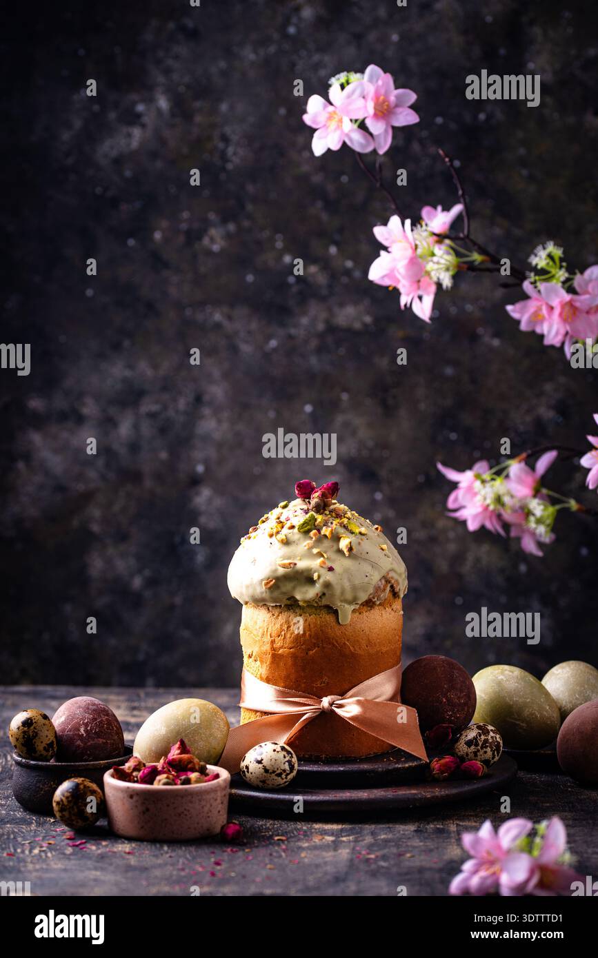 Traditional Easter cake kulich with pistachio Stock Photo