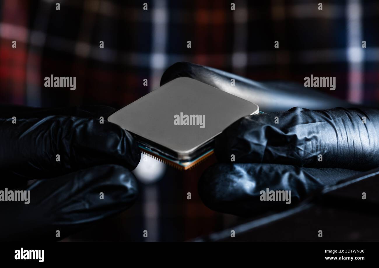 Close-Up View Of Computer Chip Technician Holding Stock Photo