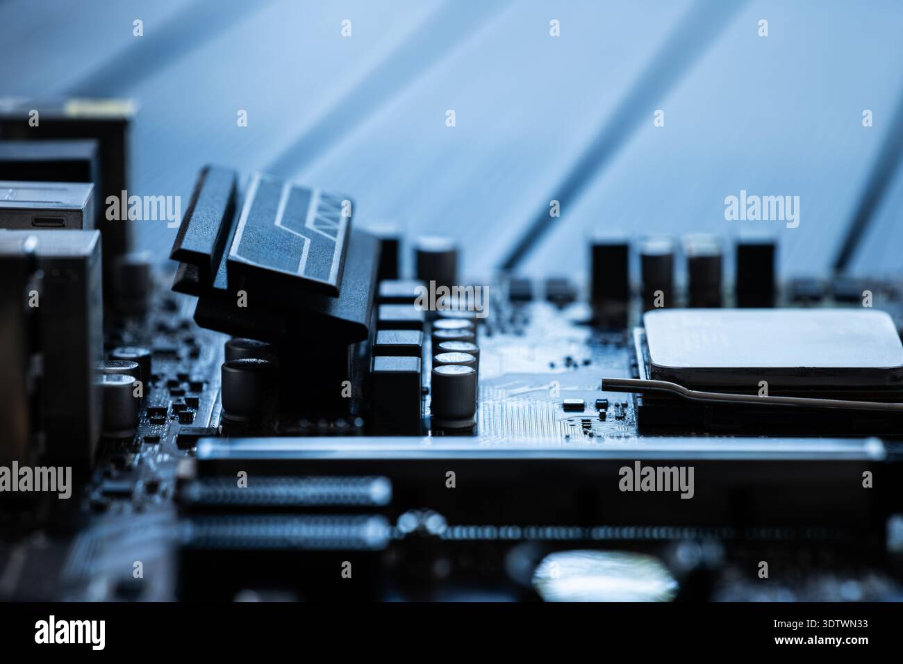 Close-Up Of A Pc Motherboard With Elements And Processor Stock Photo