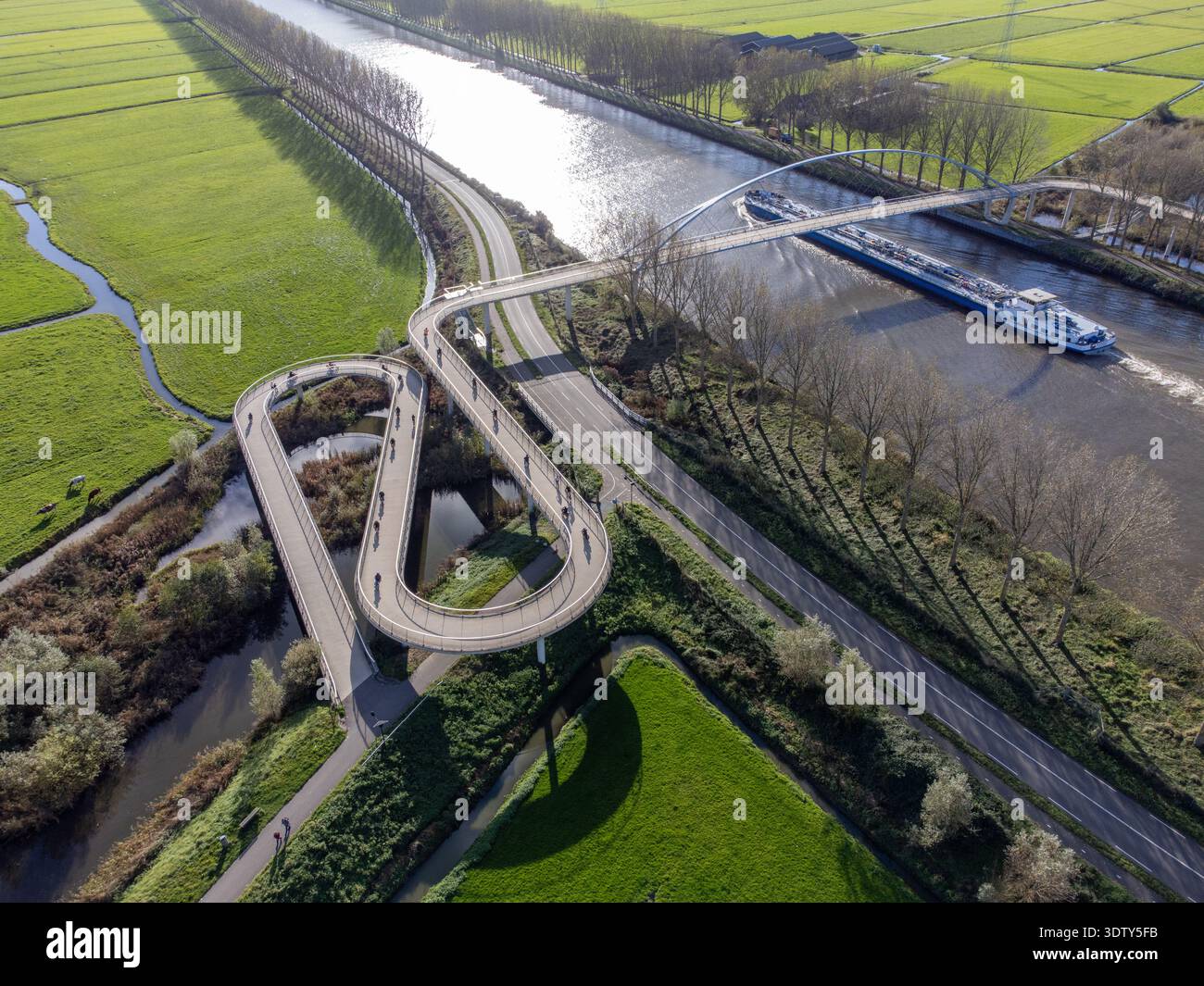 Aerial view of the looping Liniebrug bridge curving dramatically over ...