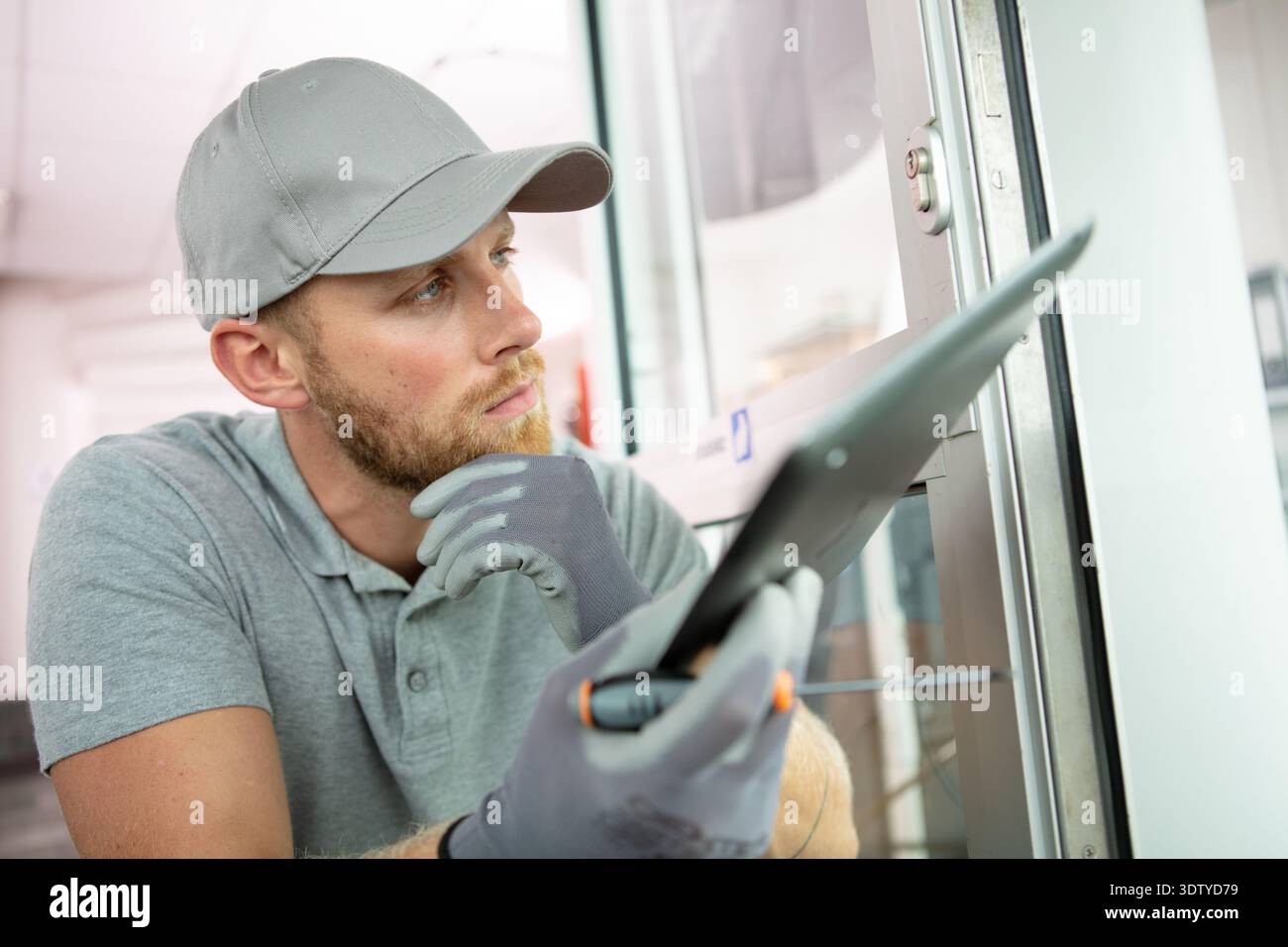 construction specialist using a tablet computer Stock Photo