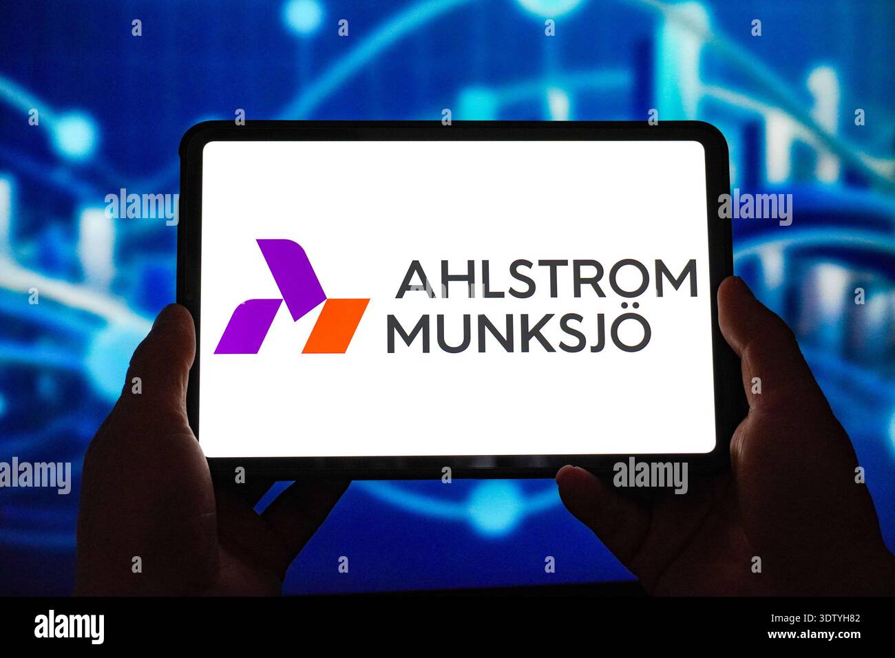 In this photo illustration, the Ahlstrom-Munksjö logo is displayed on ...