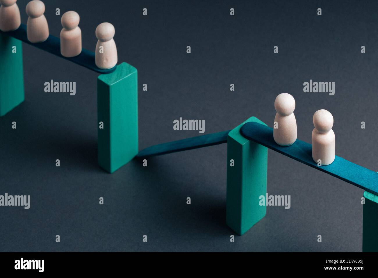 Conceptual image of talent redistribution and workforce reallocation showing team transition and organizational restructuring with reduced staff on ne Stock Photo