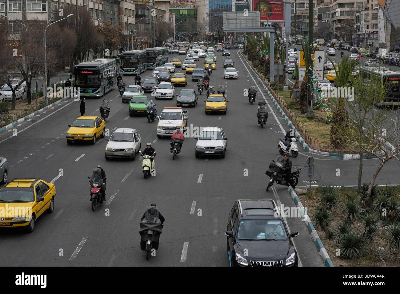 Tehran Driving Vehicles drive in downtown Tehran, Iran, Tuesday, Feb. 24, 2026. (AP ...