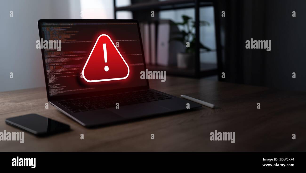 Cybersecurity warning alert concept showing system risk and code Cyber attack interface on laptop for digital security Virus, Spyware and IT protectio Stock Photo