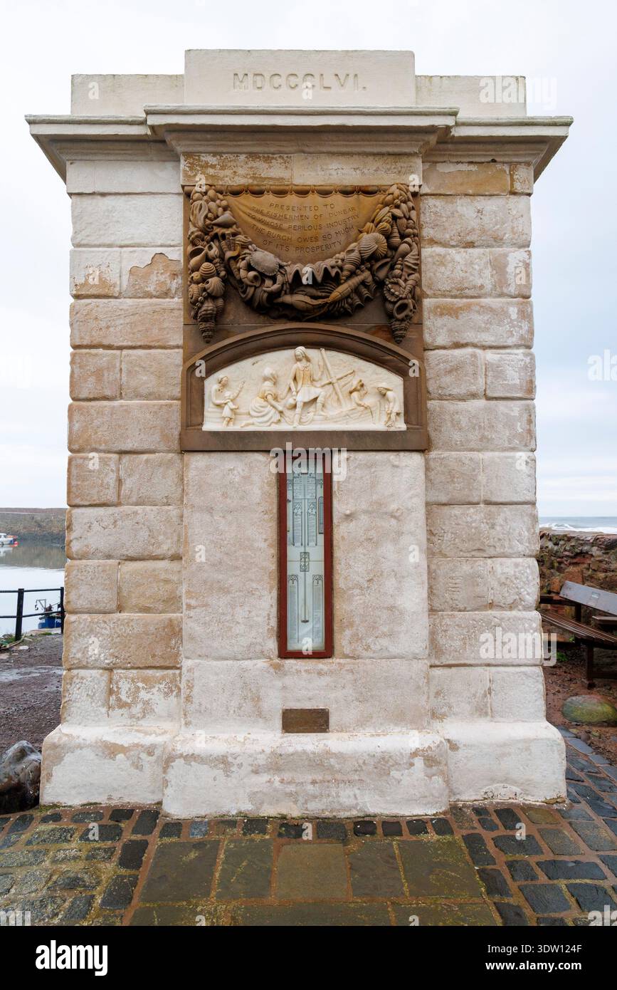 Fishermen's Monument with a Barometer for boats installation on the harbout quay, Dunbar, Scotland, UK Stock Photo