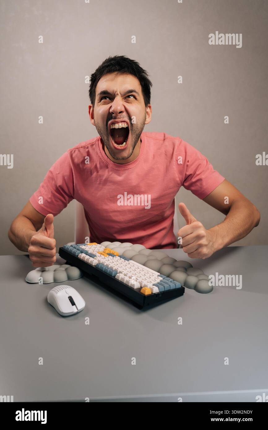 Angry man expressing both anger and satisfaction, screaming with mouth ...