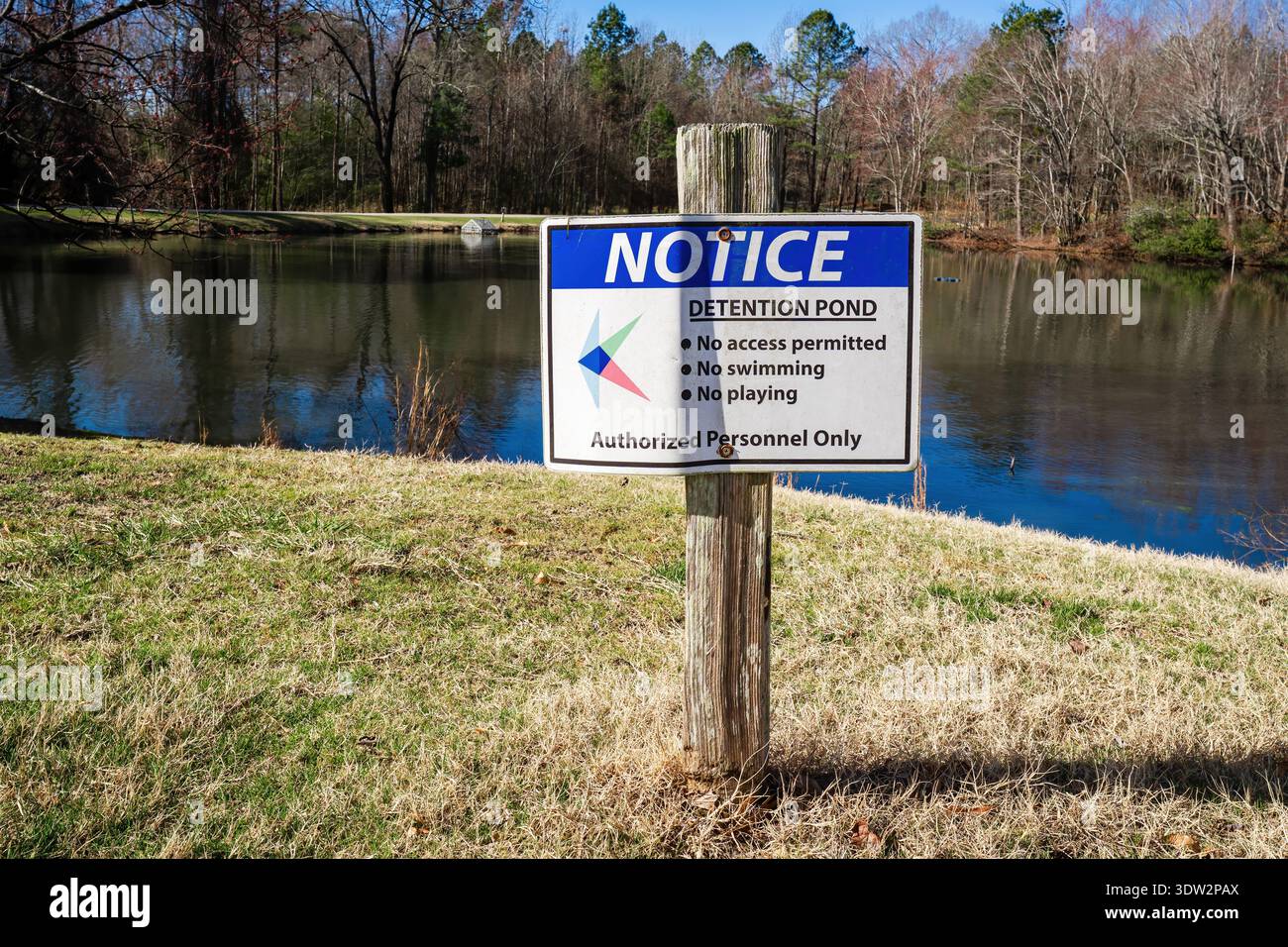 Notice sign identifying a detention pond at Knightdale Station Park ...