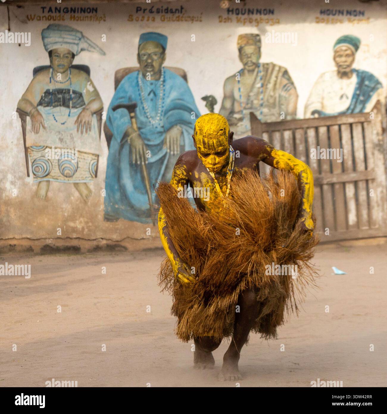 A dancer performs a ritualistic dance in traditional attire at a ...