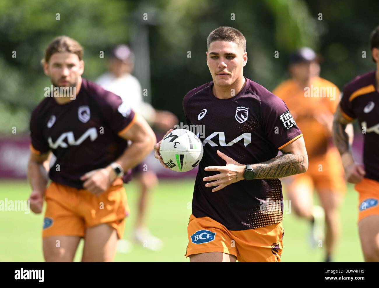 Clive Reece Reece Walsh (centre) in action during a NRL Brisbane Broncos training ...