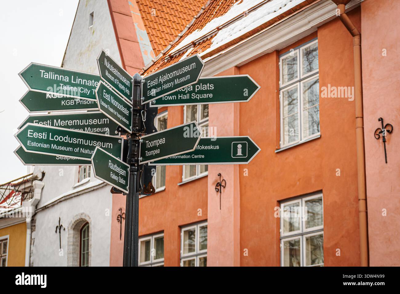 Tourist information with old historical buildings in Tallinn old town, capital of Estonia Stock Photo