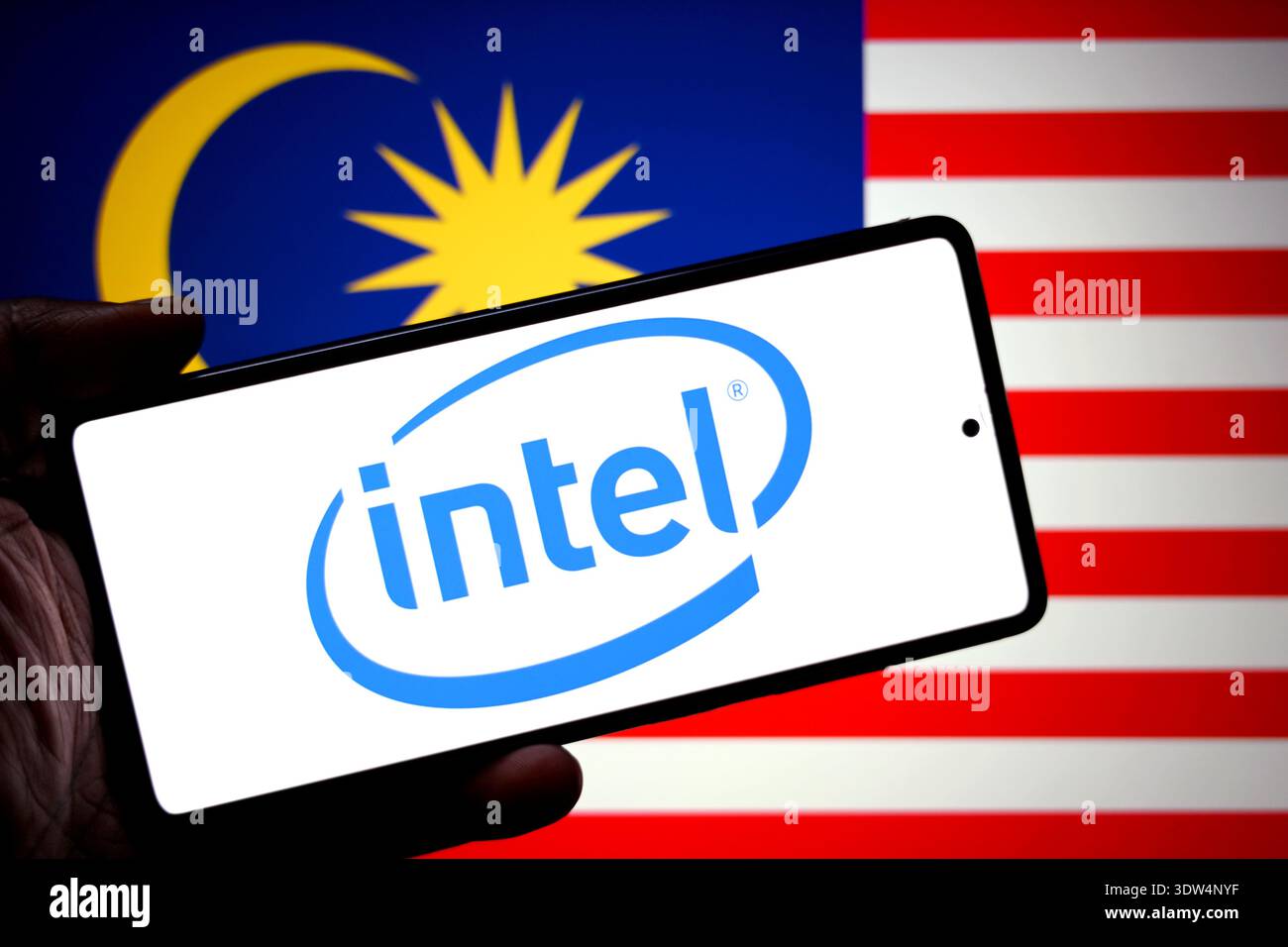 In this photo illustration, an INTEL logo is seen displayed on a ...