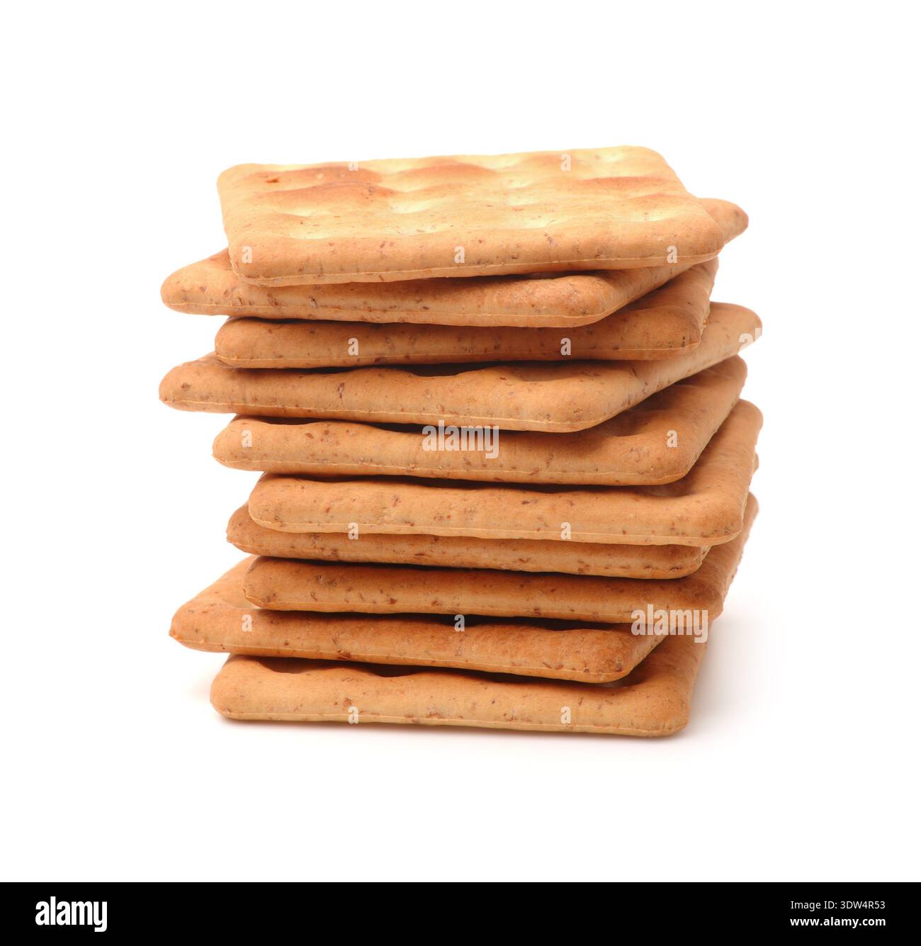 Stack of square wholegrain crackers isolated on white Stock Photo