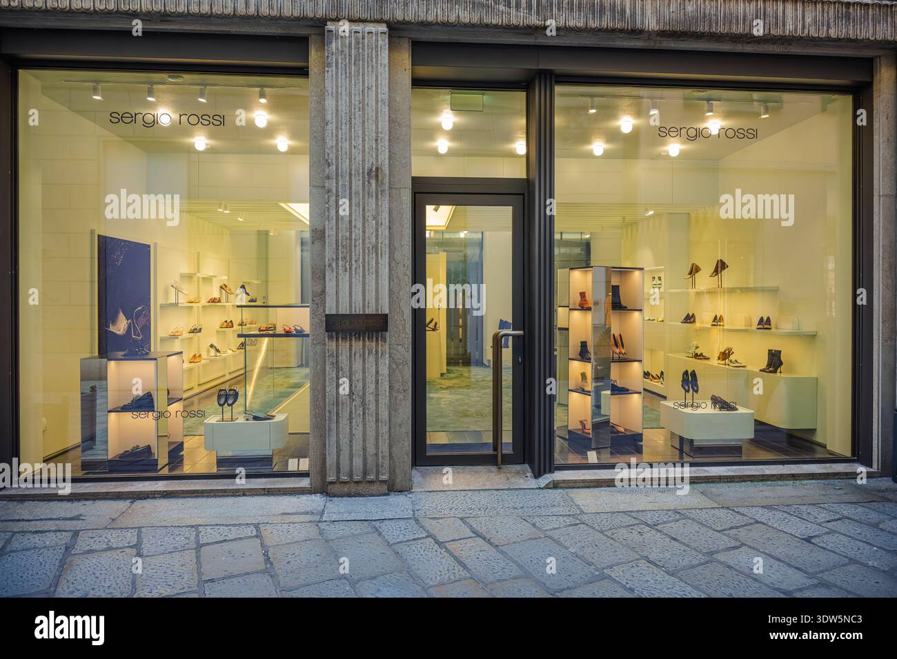 Italian Window Display Milan, Italy - 2026, 17 Feb: Sergio Rossi SS26 boutique window displays ...