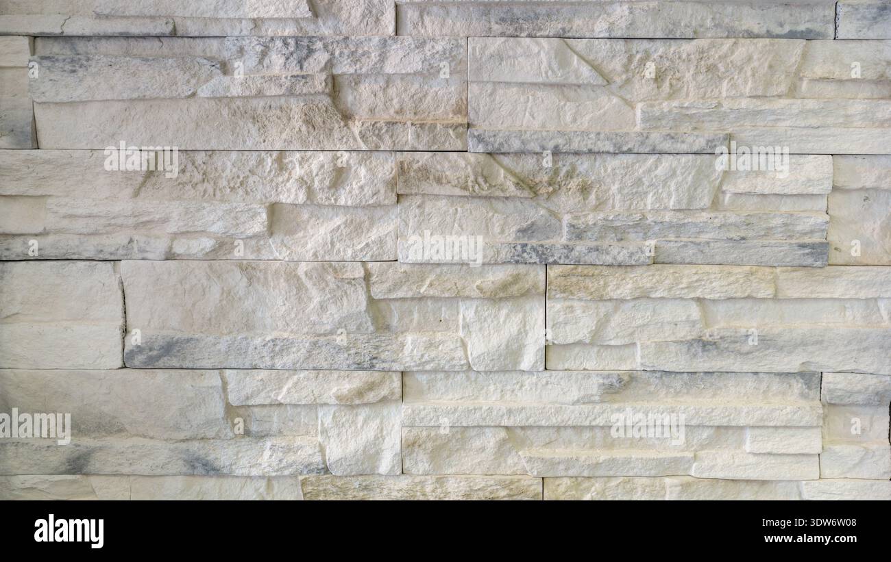 Light grunge stone wall as abstract background with copy space Stock Photo