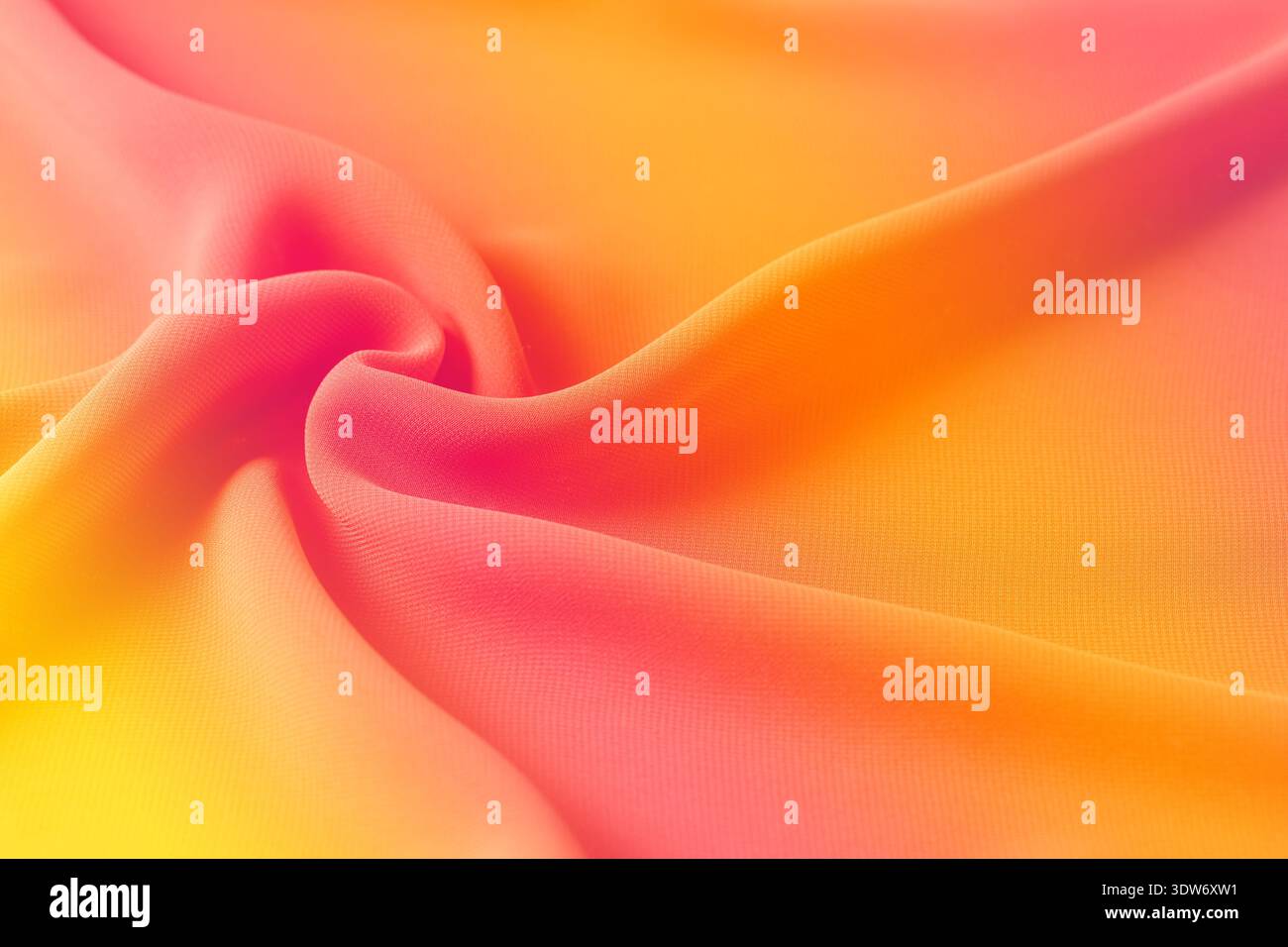 Abstract pink orange yellow gradient background. Blurred silk fabric draped texture Stock Photo