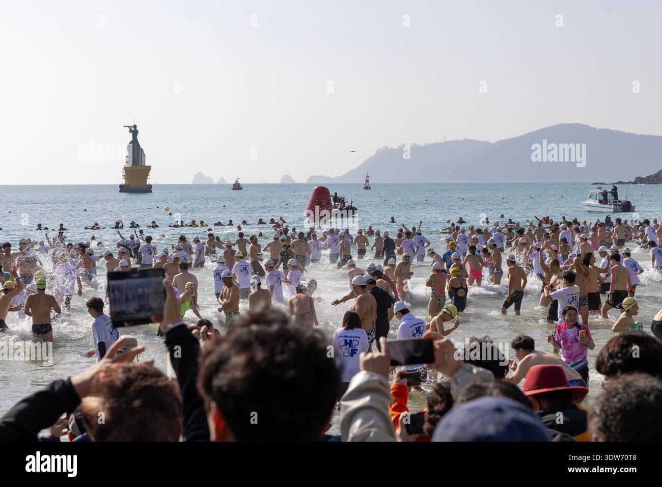 People take part in the 39th Polar Bear festival in Haeundae Beach ...