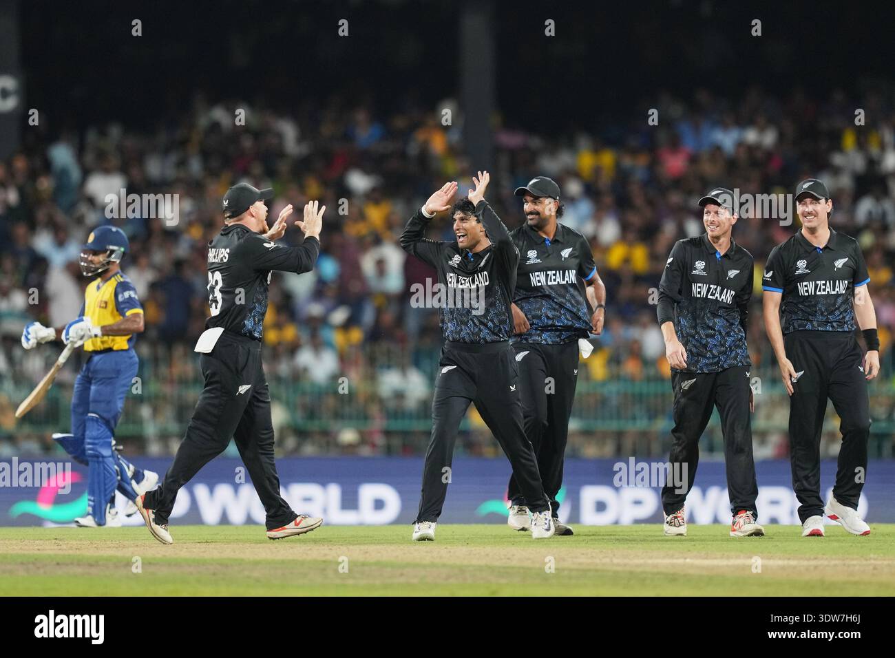 New Zealand's players celebrate the wicket of Sri Lanka's Pavan ...