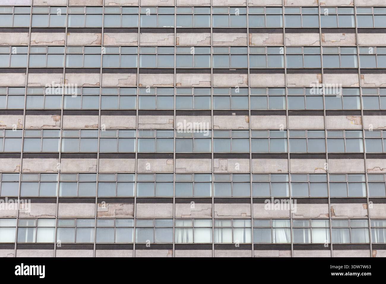 Deteriorating Building Facade Texture Ready for Demolition, Urban Decay Background" Stock Photo