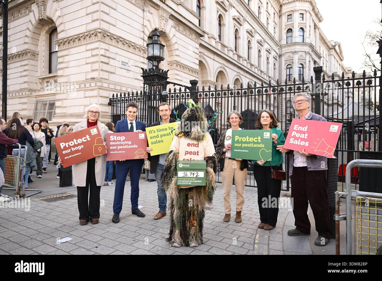 EDITORIAL USE ONLY Campaigners deliver a petition to Downing Street in ...