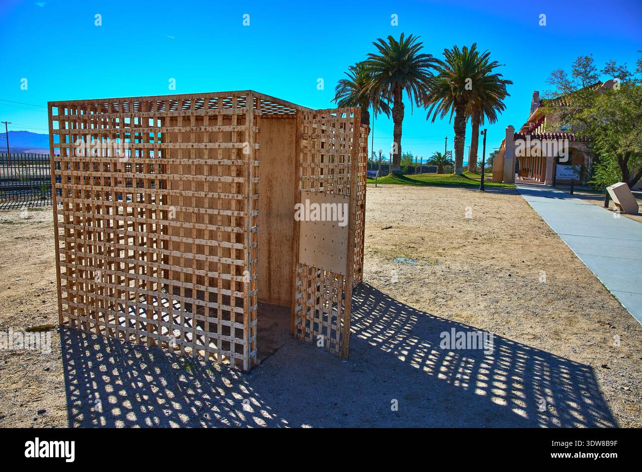 Old Wooden Jail Cell Historical Landmark and Palm Trees in Mojave ...