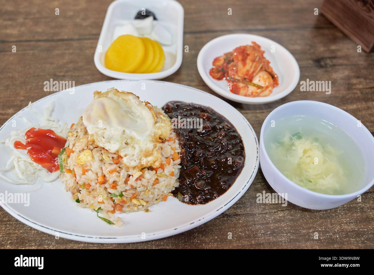 Delicious Korean-Chinese fried rice with a fried egg and black bean ...