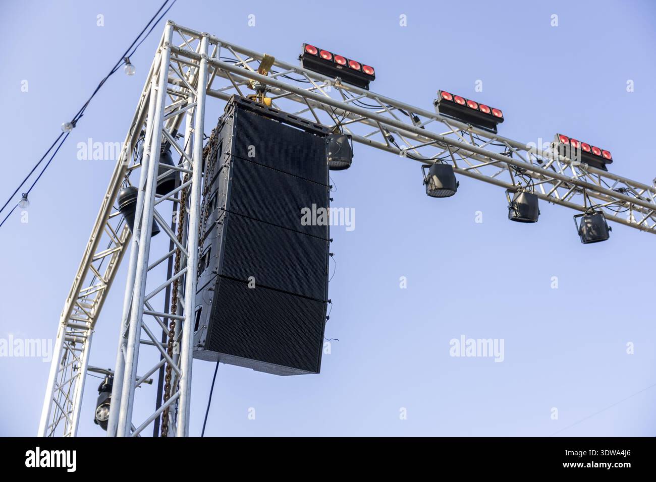 Outdoor concert stage with professional audio sound system speakers and ...