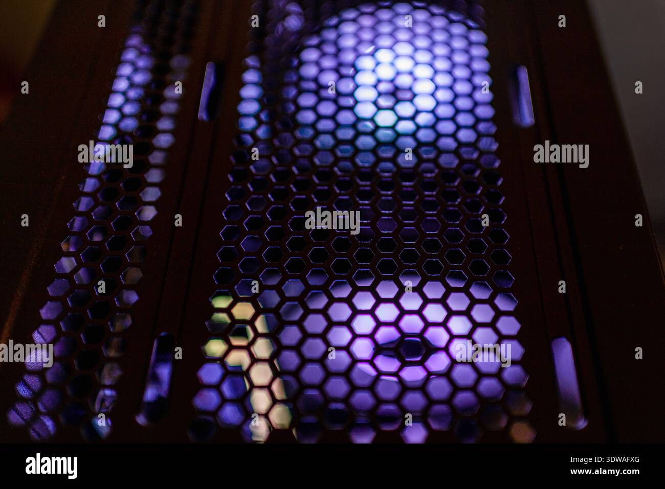 A part of rgb lights cooling illuminated fans powerful gaming computer at home with powerful fans and lights. Stock Photo