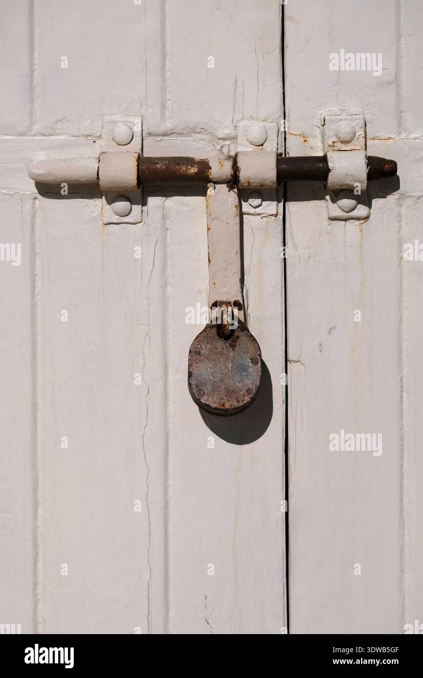 Padlock on a closed gate in Malta Stock Photo
