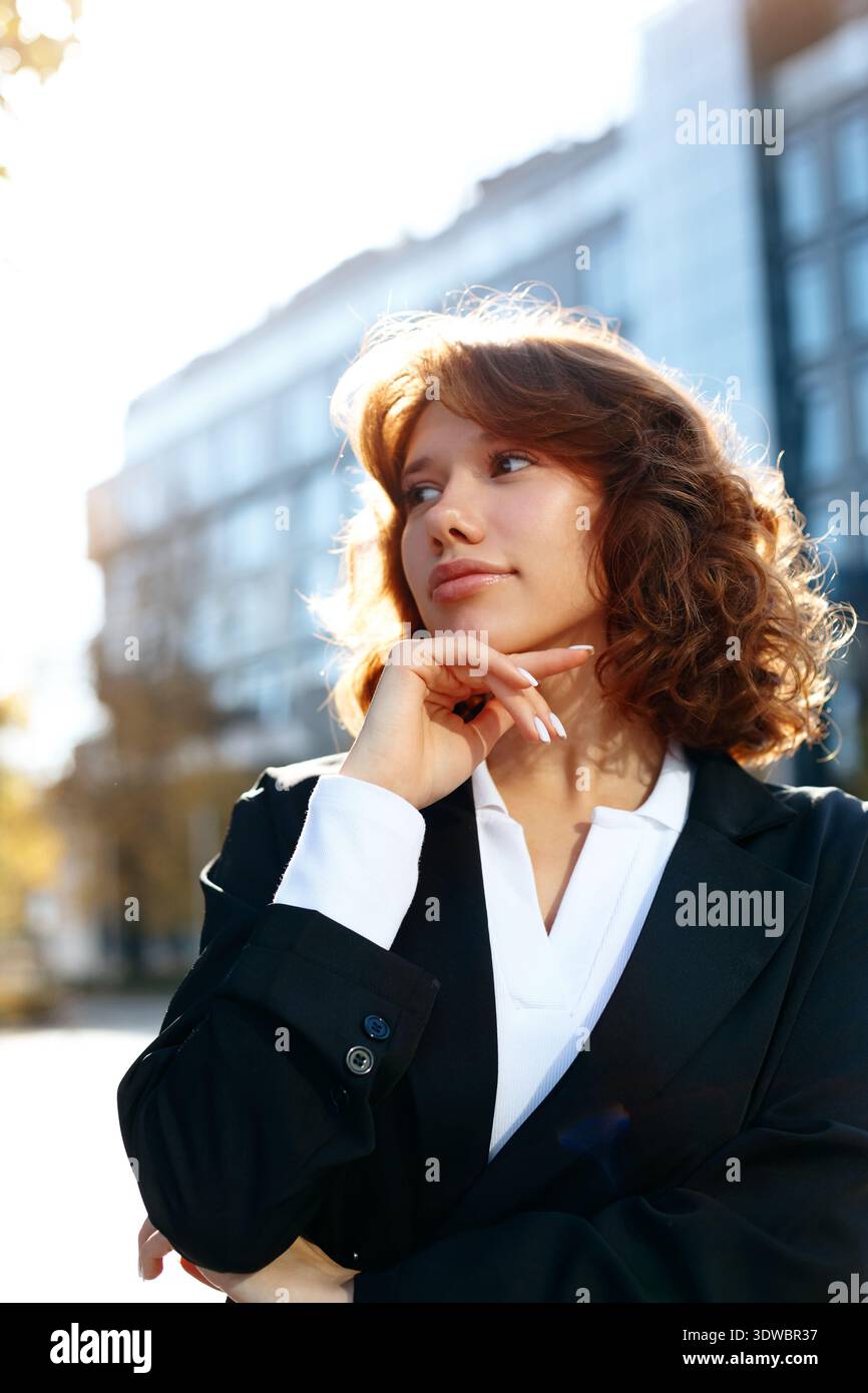 Businesswoman in black blazer hi-res stock photography and images - Alamy