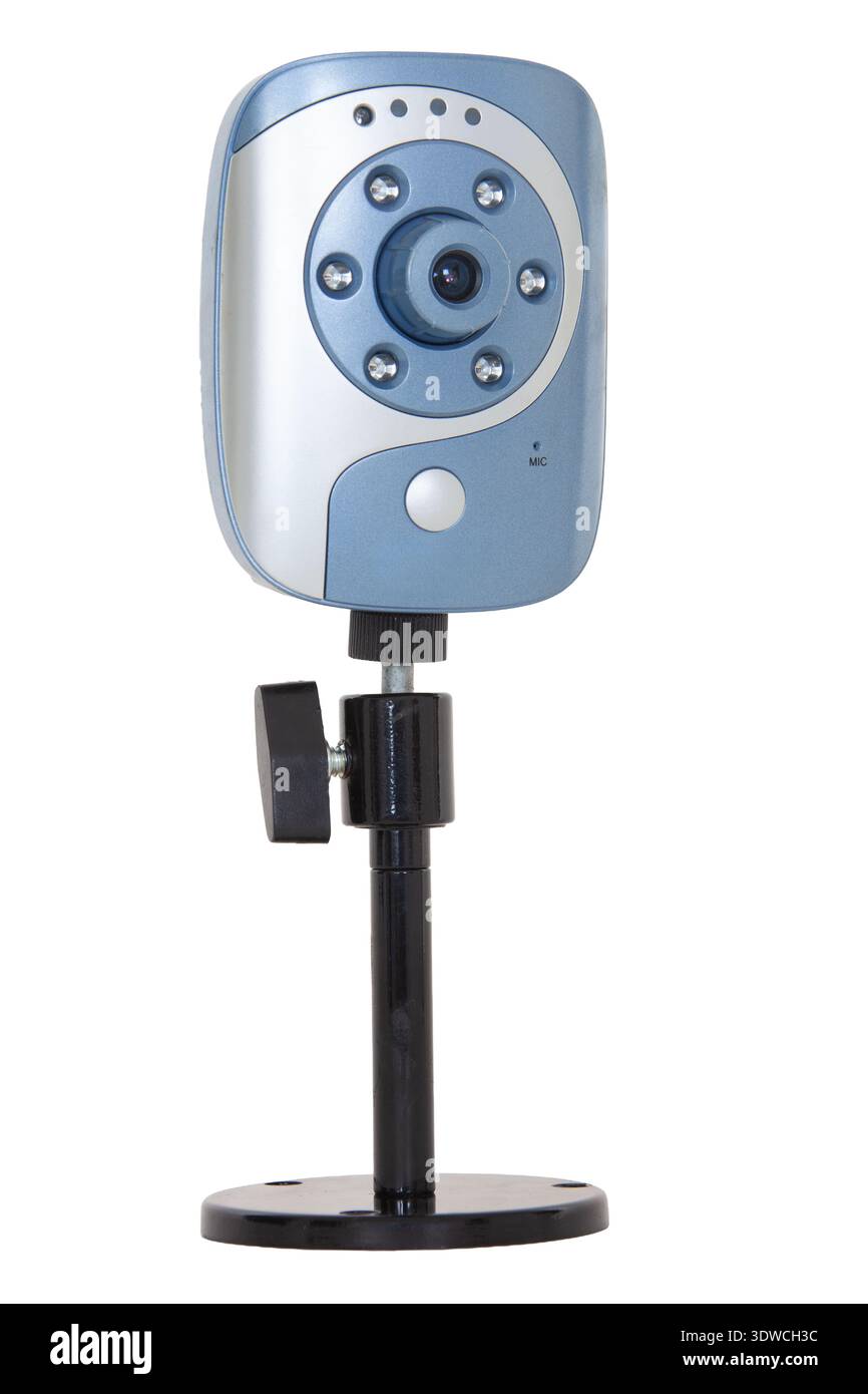 A blue and silver early-model wireless IP camera with infrared capability on an adjustable black stand. Stock Photo