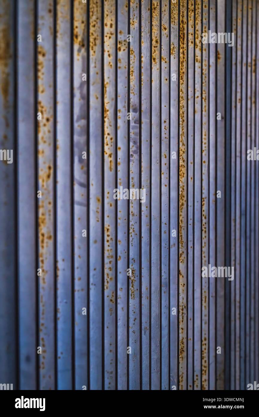 Steel With Ridged A close view of vertical steel panels reveals narrow ridges and ...