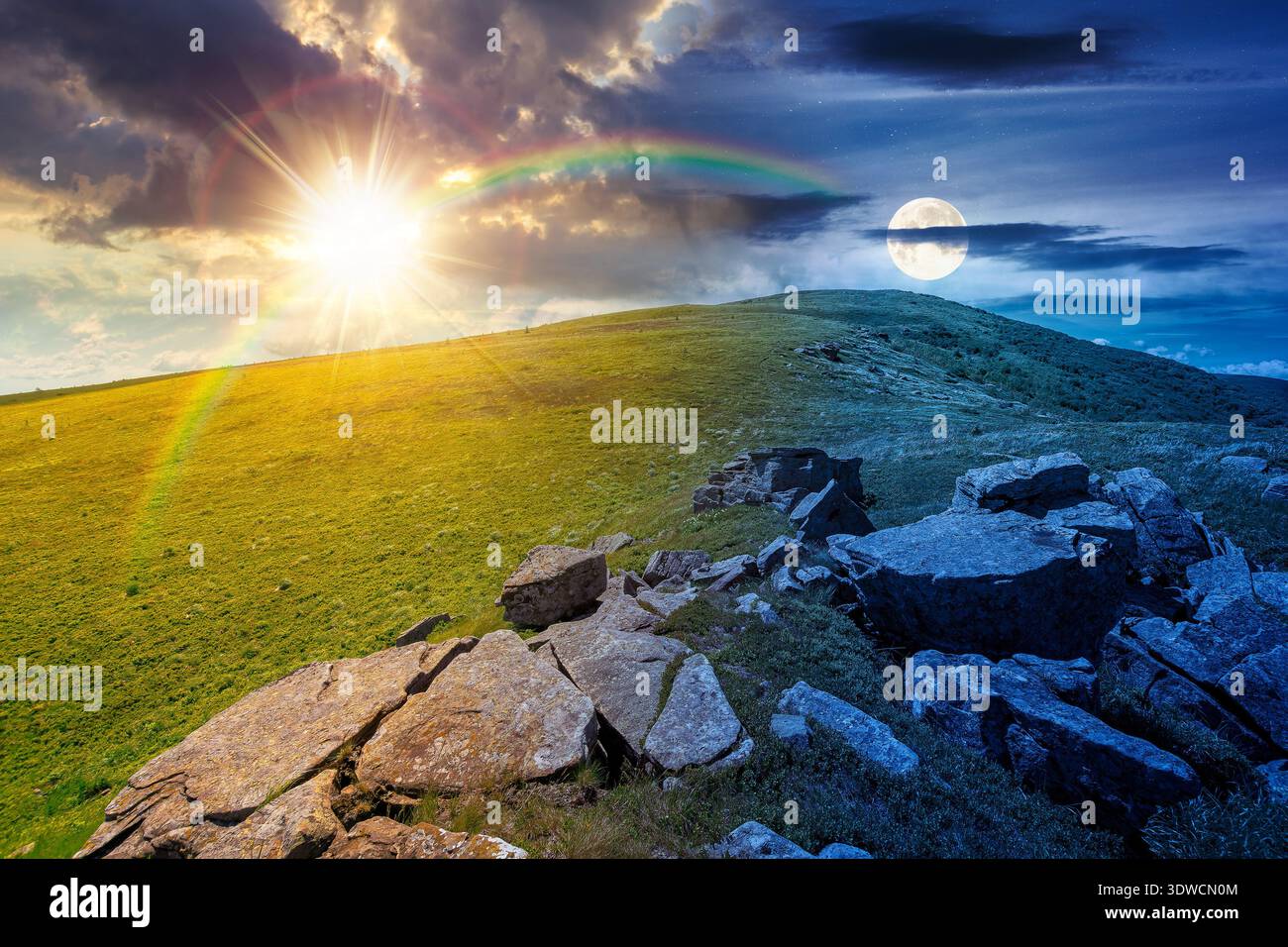 rocks and rolling hills in mountain landscape on summer solstice. day meet night. sun and moon over scenery with green grass on alpine meadow. astrolo Stock Photo