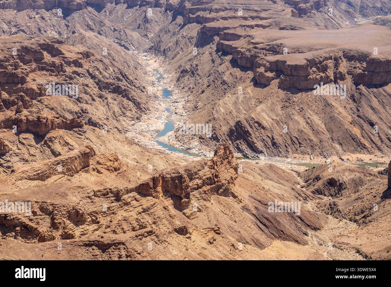 Namibia Cliffs Marvel at the expansive Fish River Canyon in Namibia, showcasing its ...