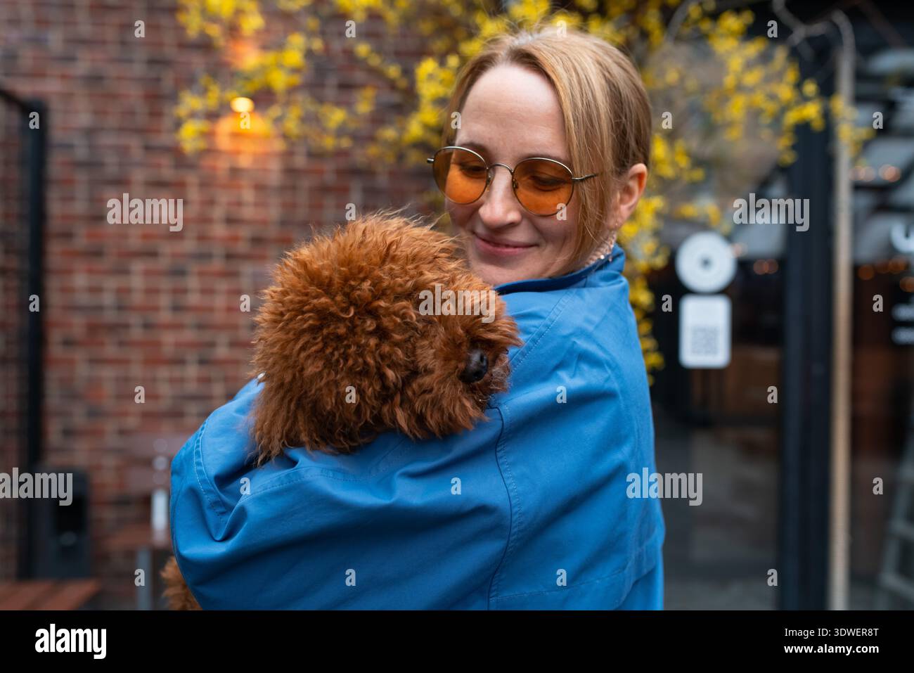 Woman happily embraces nature hi-res stock photography and images - Alamy