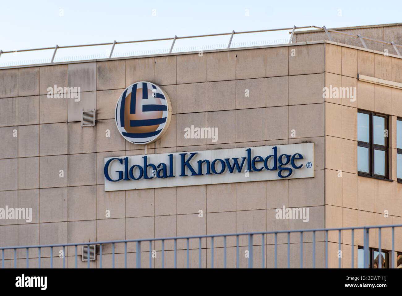 Sign and logo on the headquarters of Global Knowledge Network France. Global Knowledge is a global American IT and technology training group Stock Photo