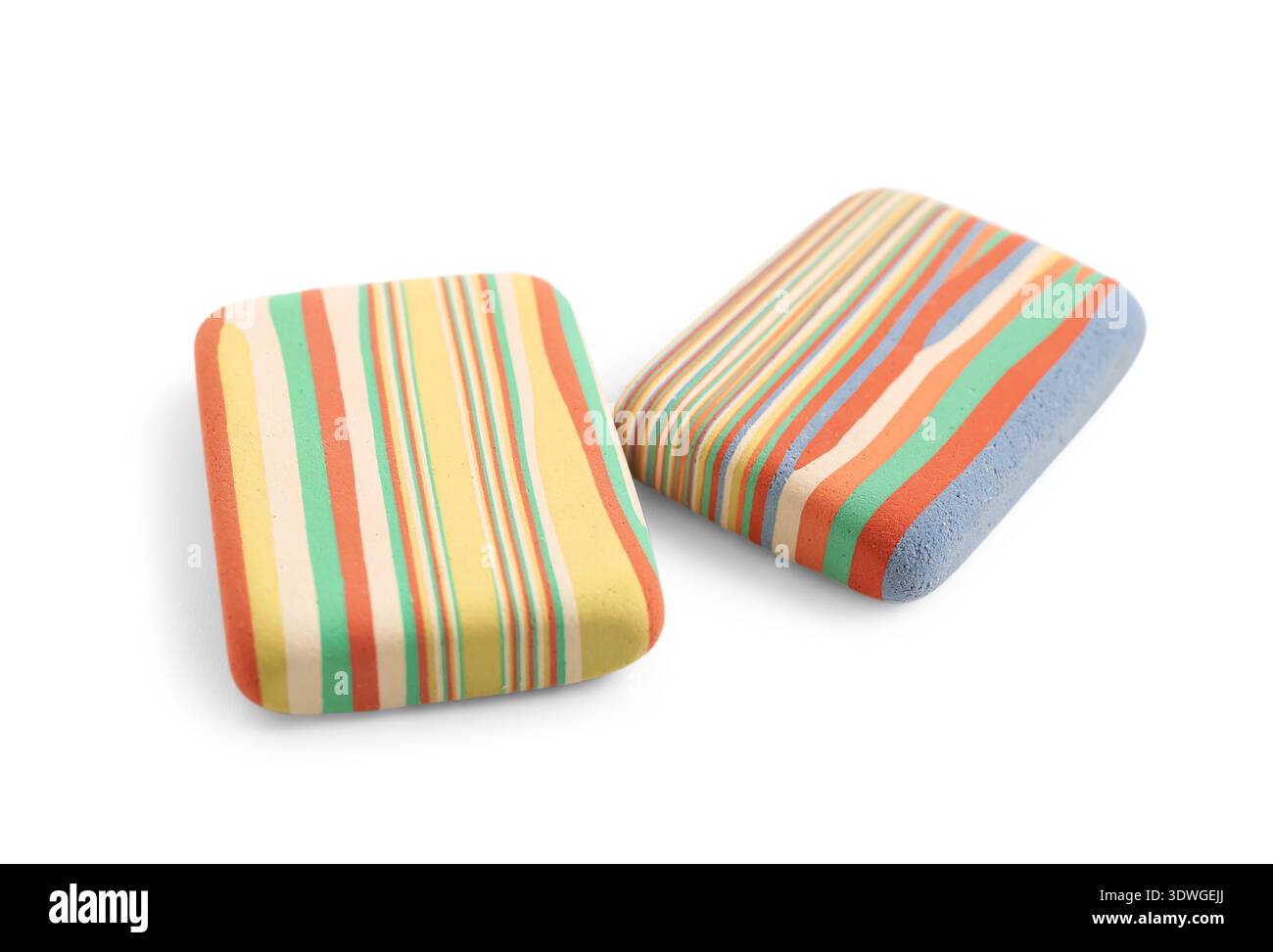 Colorful rubber erasers on white background Stock Photo