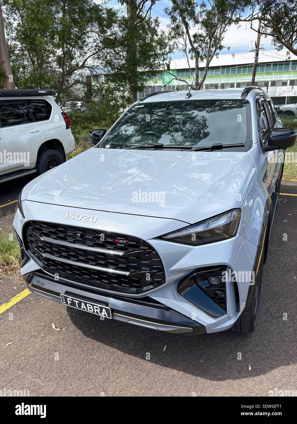 2025 model Isuzu  MU-X SUV vehicle with personalised number plate parked in a Sydney street,NSW,Australia - Smartphone Captured Stock Image