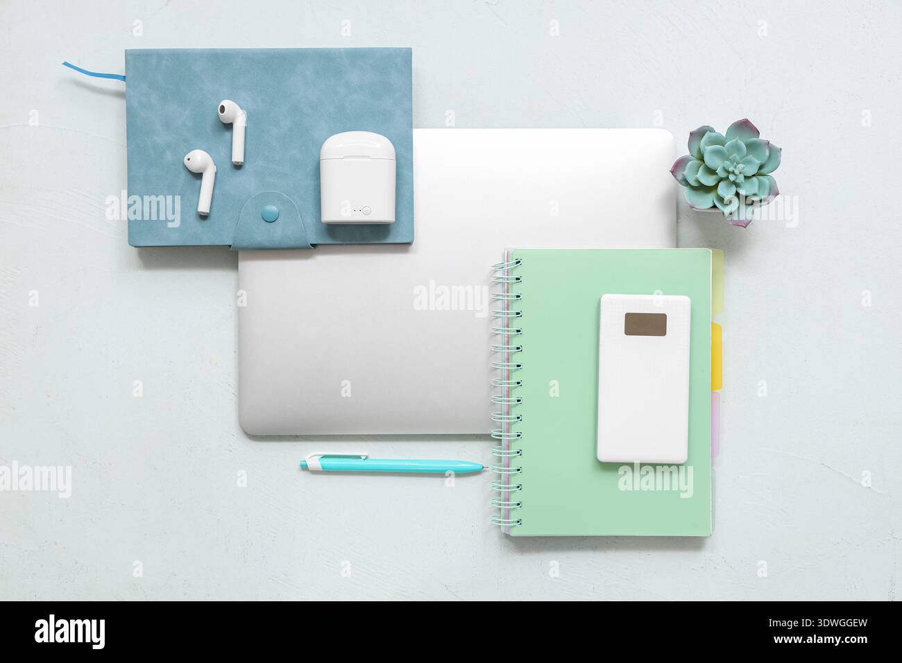 Modern gadgets with notebooks on white background Stock Photo