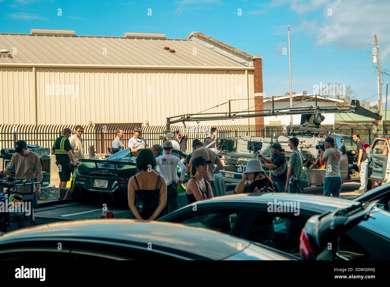 Large film production crew and technical staff gathered around a 