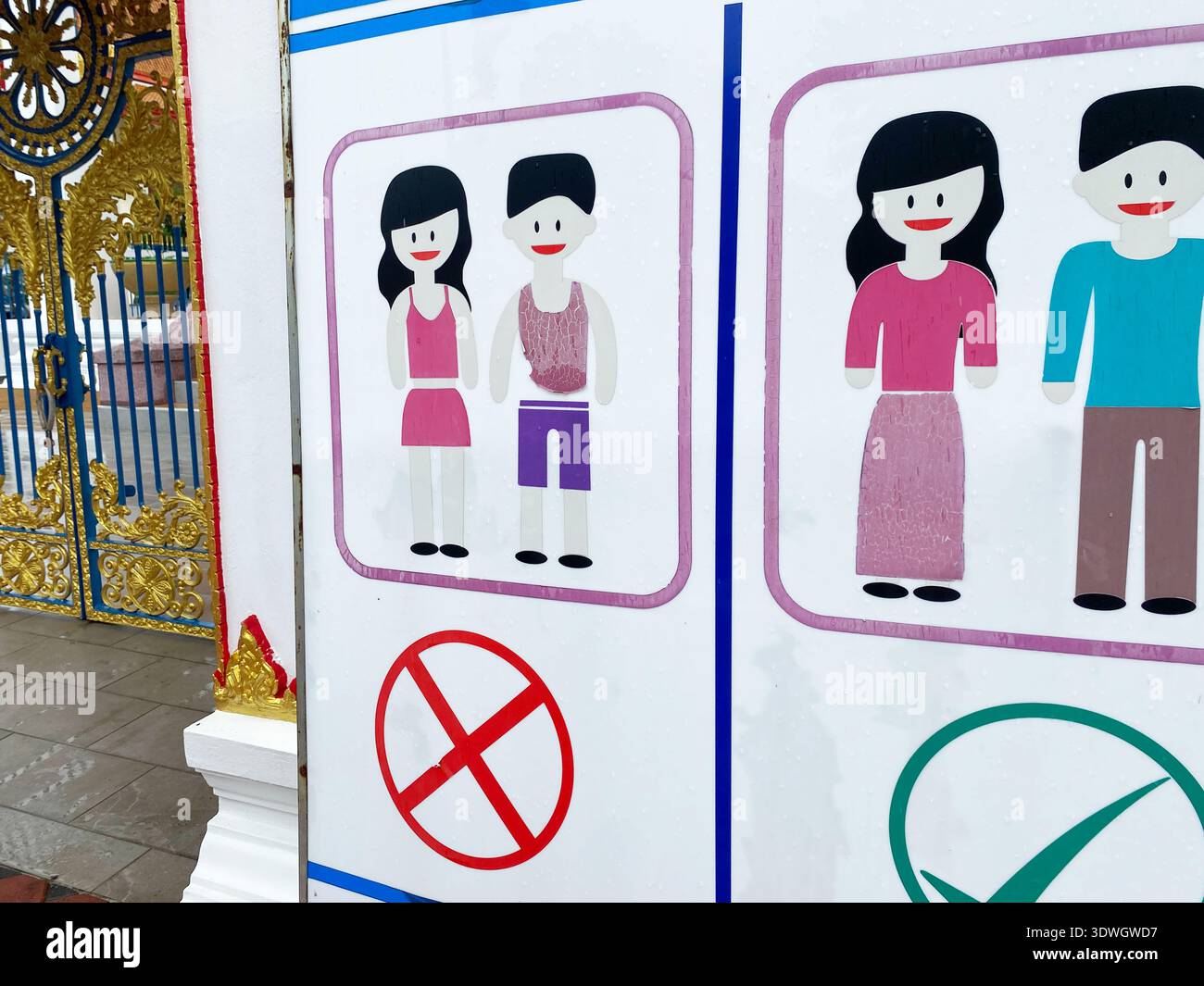 No In Appropriate. Sign Warning sign at a Thai temple entrance shows illustrations of ...