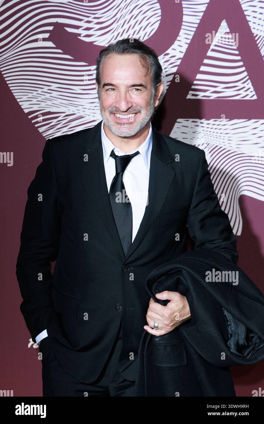 Jean Dujardin posing upon arrival at the Gala Dinner following the 51st